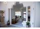 Elegant foyer with decorative columns leading to the living room and a glimpse of the kitchen at 4288 Wyndham Park Cir, Decatur, GA 30034