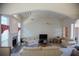 Open living room with fireplace, a ceiling fan, and comfortable furniture at 4288 Wyndham Park Cir, Decatur, GA 30034
