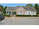 Community clubhouse with brick accents and ample parking at 515 Quinn Dr, Woodstock, GA 30188
