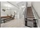 Bright dining area featuring modern decor, light floors and a staircase with a safety gate at 515 Quinn Dr, Woodstock, GA 30188