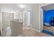 Upstairs hallway with neutral paint and carpet, and a view of the staircase and several bedrooms at 515 Quinn Dr, Woodstock, GA 30188