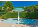 Community splash pad with a fun mushroom-shaped fountain, surrounded by greenery for Gathering fun at 515 Quinn Dr, Woodstock, GA 30188