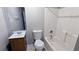Cozy bathroom featuring a vanity with a wood cabinet, toilet, and a tub with a shower at 831 Stonebrook Dr, Lithonia, GA 30058
