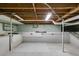 Unfinished basement with concrete floor, exposed pipes and support columns at 1083 Amelia Sw Dr, Marietta, GA 30060