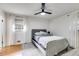 Bedroom with light gray walls and a bed with a patterned blanket at 1083 Amelia Sw Dr, Marietta, GA 30060