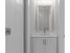 Bathroom featuring a white sink, mirror, white shower with glass doors at 1975 Sage Lake Bend Sw, Marietta, GA 30064