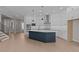 Modern kitchen with white cabinets, stainless steel appliances, and a large center island at 1975 Sage Lake Bend Sw, Marietta, GA 30064