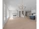 Open-concept living room featuring a fireplace, hardwood floors, and seamlessly connecting to the kitchen at 1975 Sage Lake Bend Sw, Marietta, GA 30064