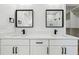 Modern bathroom features a double vanity, square mirrors, and matte black hardware at 7180 Whitfield Dr, Riverdale, GA 30296
