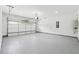This bright and spacious two car garage features an epoxy floor and plenty of room for storage at 7180 Whitfield Dr, Riverdale, GA 30296