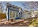 Backyard showing a small blue outbuilding with glass doors and a small porch at 247 Heaton Park Dr, Atlanta, GA 30030