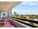 Condo balcony offers views of the cityscape and surrounding greenery at 2660 Peachtree Nw Rd # 11G, Atlanta, GA 30305