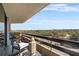 Condo balcony with comfortable seating overlooks lush green scenery at 2660 Peachtree Nw Rd # 11G, Atlanta, GA 30305