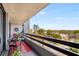 Condo balcony offers views of the cityscape and surrounding greenery at 2660 Peachtree Nw Rd # 11G, Atlanta, GA 30305