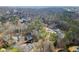 Scenic aerial view of a residential neighborhood featuring mature trees at 4165 Liberty Trce, Marietta, GA 30066