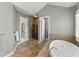 Bright bathroom features a luxurious tub, tiled shower, and neutral decor at 4165 Liberty Trce, Marietta, GA 30066