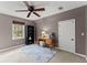 Functional bedroom with desk, bookshelf and natural light at 4165 Liberty Trce, Marietta, GA 30066