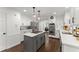 Beautiful kitchen featuring an island, white cabinetry, stainless steel appliances, and modern design at 4165 Liberty Trce, Marietta, GA 30066