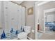 Bathroom featuring a shower/tub combo with a nautical themed shower curtain at 586 Shoal Mill Sw Rd, Smyrna, GA 30082