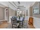 Elegant dining room featuring decorative trim, stylish lighting, and a spacious layout at 586 Shoal Mill Sw Rd, Smyrna, GA 30082