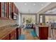 Open-concept kitchen flows into the breakfast nook, featuring stainless steel appliances and granite countertops at 586 Shoal Mill Sw Rd, Smyrna, GA 30082