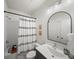 Clean bathroom with a shower/tub combination and a modern vanity at 166 Color Cir, Atlanta, GA 30317