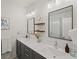 Bathroom featuring a double sink vanity with modern fixtures and plenty of counter space at 166 Color Cir, Atlanta, GA 30317