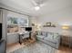 Comfortable bedroom featuring a window with natural light and neutral decor at 166 Color Cir, Atlanta, GA 30317