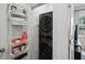 Functional laundry room with stackable washer and dryer and convenient storage solutions at 166 Color Cir, Atlanta, GA 30317