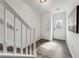 Entryway with hardwood floors, staircase, and a door with decorative glass at 185 Willow Stream Ct, Roswell, GA 30076