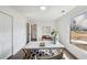 Stylish home office with a modern desk and view from a large window at 185 Willow Stream Ct, Roswell, GA 30076