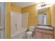 Bathroom with a bathtub, shower, toilet, and vanity at 4183 Ward Lake Trl, Ellenwood, GA 30294