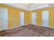 Spacious bedroom with multiple closets and neutral carpet at 4183 Ward Lake Trl, Ellenwood, GA 30294