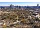 Aerial view of the property with a view of the Midtown and Downtown skylines at 1051 Curran Nw St, Atlanta, GA 30318