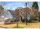 Charming two-story home with a well-maintained lawn, a two-car garage, and an inviting red front door at 2859 Royal Blf, Decatur, GA 30030