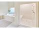 Bright bathroom with large soaking tub and walk-in shower at 3196 Andrews Nw Ct, Atlanta, GA 30305