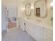 Bathroom with marble countertops and double vanities at 3196 Andrews Nw Ct, Atlanta, GA 30305