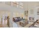 Elegant living room with a fireplace, built-in shelving, and an open view to the dining area at 3196 Andrews Nw Ct, Atlanta, GA 30305