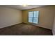 Standard bedroom with one window and neutral paint at 5928 Springfair Run, Lithonia, GA 30038