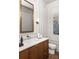 Stylish bathroom featuring a marble vanity, modern lighting, and elegant fixtures at 1131 Lupo Loop, Chattahoochee Hills, GA 30268