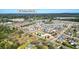 Expansive aerial view of neighborhood, highlighting community amenities, and the home's location at 117 Cottage Nw Walk, Cartersville, GA 30121