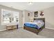Bedroom featuring a bed, a large window with blinds, and a toy box at 117 Cottage Nw Walk, Cartersville, GA 30121
