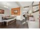 The dining room features a rustic wooden table and bench seating beneath a decorative chandelier at 117 Cottage Nw Walk, Cartersville, GA 30121