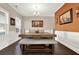Traditional dining area showcases a wooden table, bench seating, neutral walls, and artwork at 117 Cottage Nw Walk, Cartersville, GA 30121