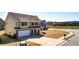 This home has an attached two-car garage and sits on a large lot at 117 Cottage Nw Walk, Cartersville, GA 30121