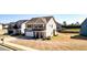 This lovely two-story home boasts a well-manicured lawn and a convenient two-car attached garage at 117 Cottage Nw Walk, Cartersville, GA 30121