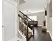 View of a staircase with a view of the living room and an office at 117 Cottage Nw Walk, Cartersville, GA 30121