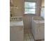 Laundry room featuring a washer and dryer at 470 Yearling Dr, Loganville, GA 30052