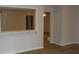 Bright living room featuring hardwood floors and an open view into another room at 545 Haymarket Ct, Riverdale, GA 30296