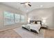 Inviting bedroom with a large window, neutral tones, and stylish decor at 2474 Norwood Park Xing, Atlanta, GA 30340